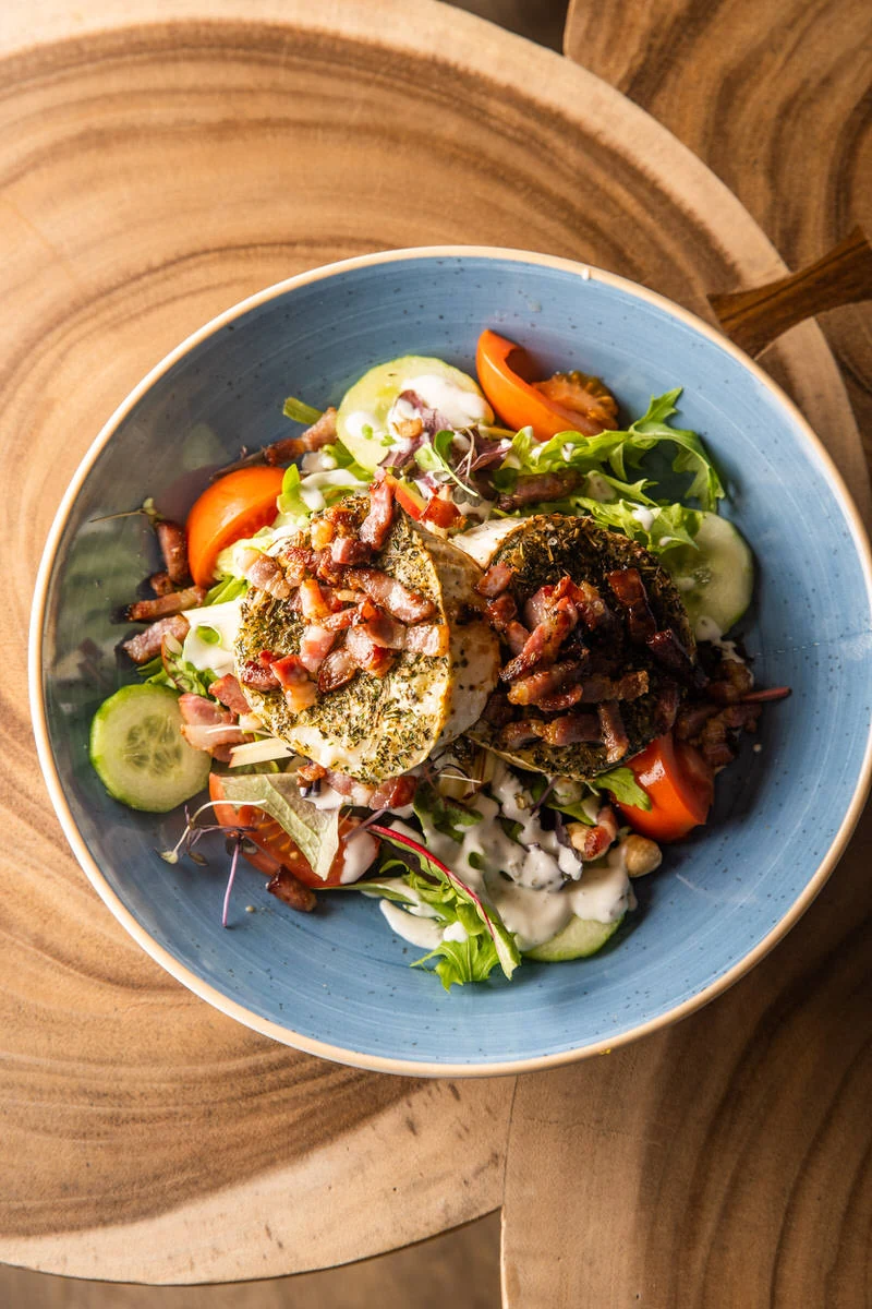 A fresh dish in a blue bowl at Terrazza Latem